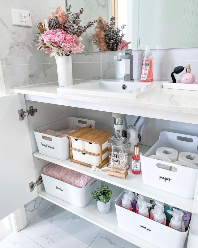 Bathroom Vanity under sink with bamboo storage accent. SEO: labeled storage bins for bathroom.