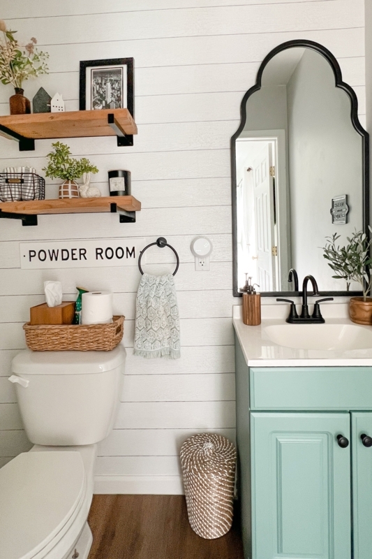 Bathroom Vanity with Teal Cabinet, Shiplap Wall & Scalloped Mirror