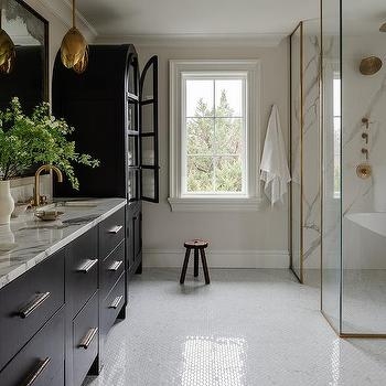 Bathroom with Black Vanity, Marble Countertop, and Arched Cabinet