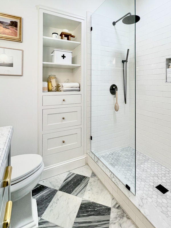 Bathroom with Chevron Marble Floor Design and Built-In Storage Cabinet