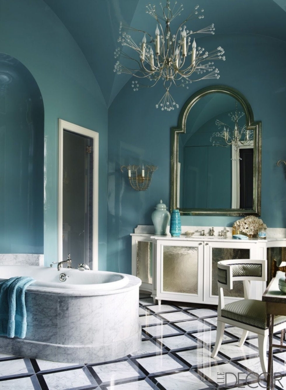 Bathroom with Glossy Teal Walls & Geometric Floor Pattern