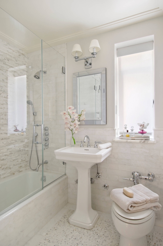 Bathroom with Pedestal Sink and Frameless Glass Shower Panel