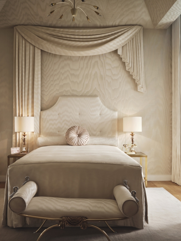 Bed with Asymmetrical Canopy Swag and Monochromatic Champagne Design
