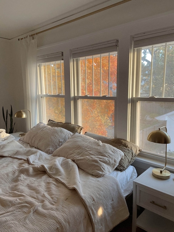 Bed with Crinkle Linen Bedding and Brass Dome Lamps