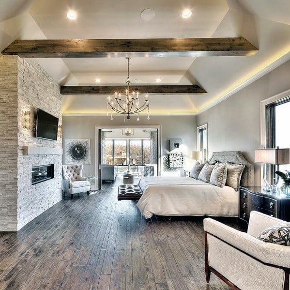 Bed with Exposed Beams & Stacked Stone Fireplace, Rustic Modern