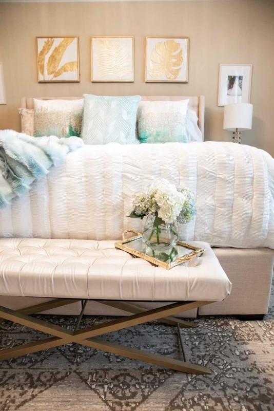 Bed with Ruched White Bedding, Teal Accents & Botanical Art Gallery