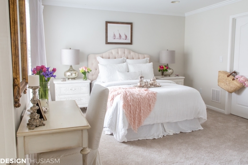 Bed with Tufted Headboard, Ruffled Pink Throw, and Whitewashed Desk