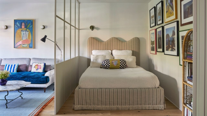 Bed with Wavy Striped Upholstered Headboard in Glass Partition Nook