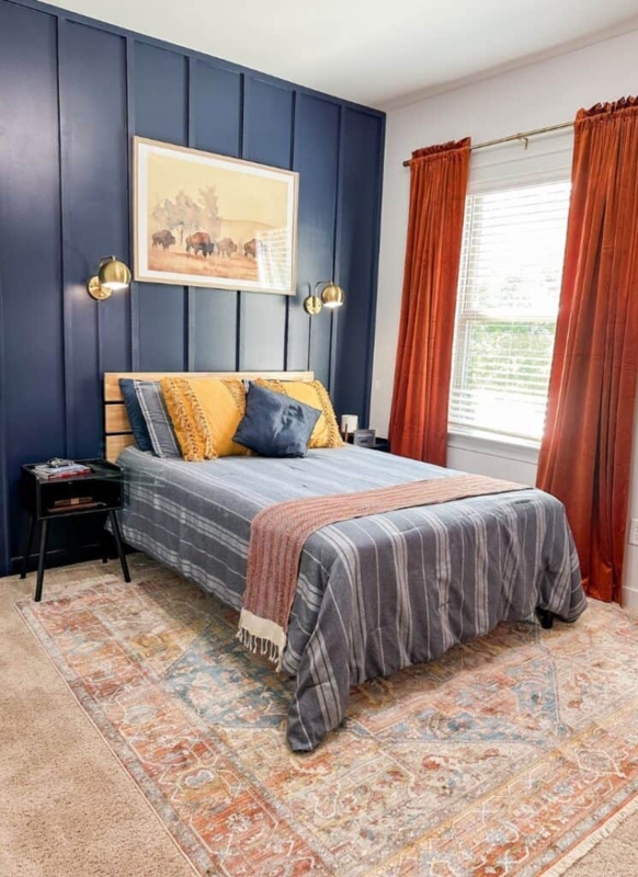 Bedroom Decor with Navy Board and Batten Wall and Rust Drapery