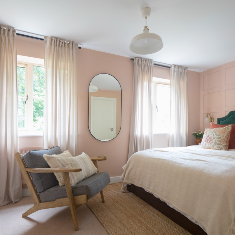 Bedroom Grid Wall Paneling in Blush Pink with Mid-Century Accent Chair