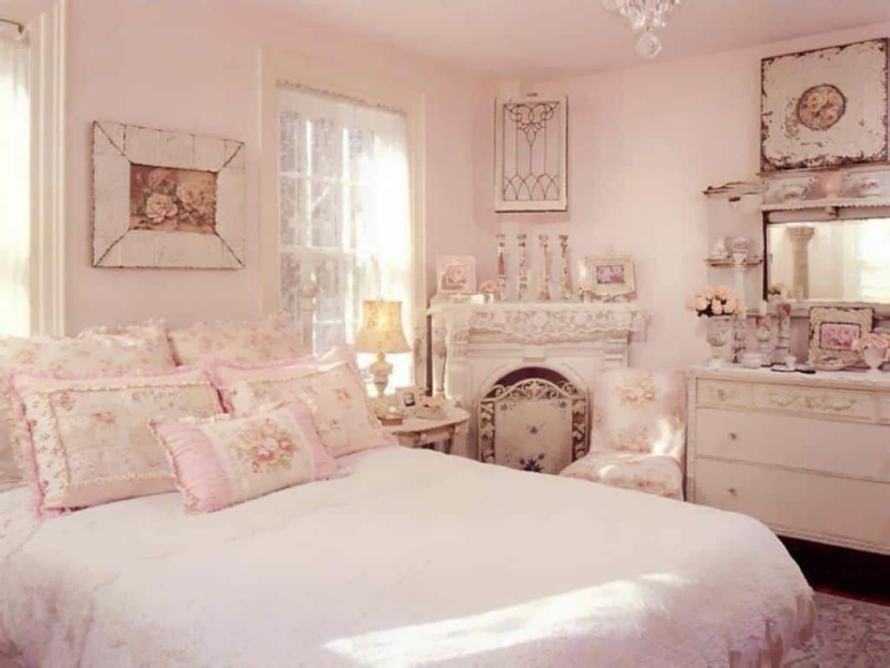 Bedroom Romantic Style with Pale Pink Walls and Ornate Fireplace