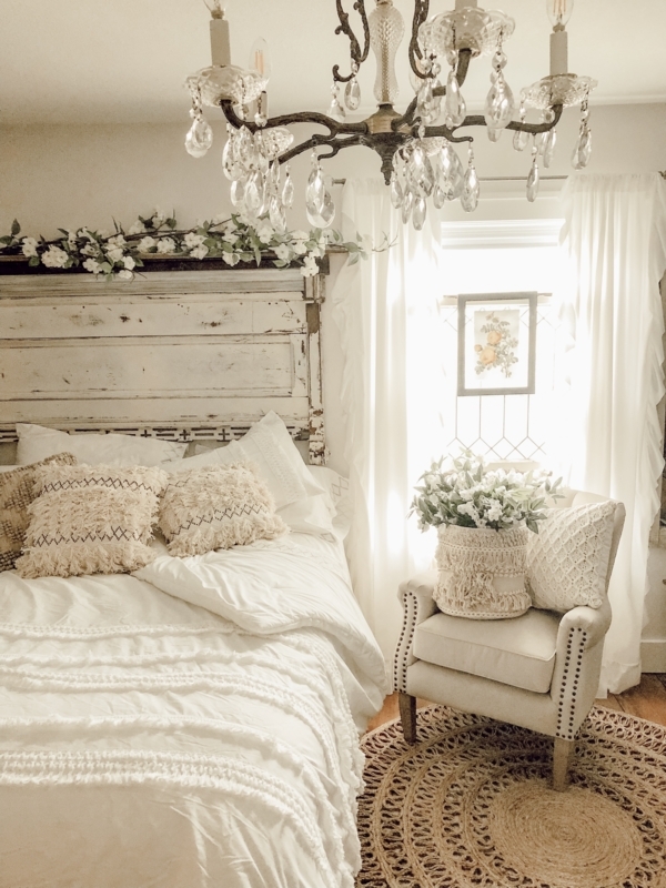 Bedroom Scene Whitewashed Plank Headboard and Crystal Chandelier