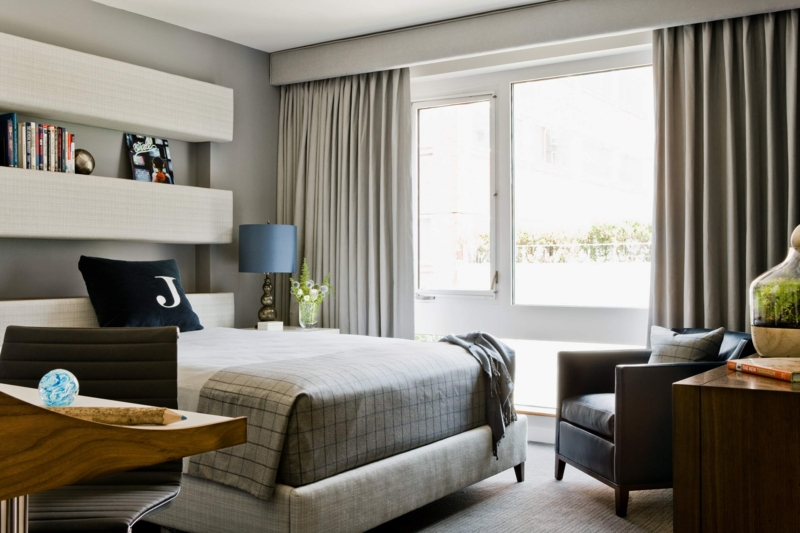 Bedroom with Windowpane Plaid Bedding and Floating Wall Shelves