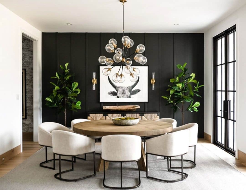 Black Accent Wall Dining Room featuring Board and Batten Design