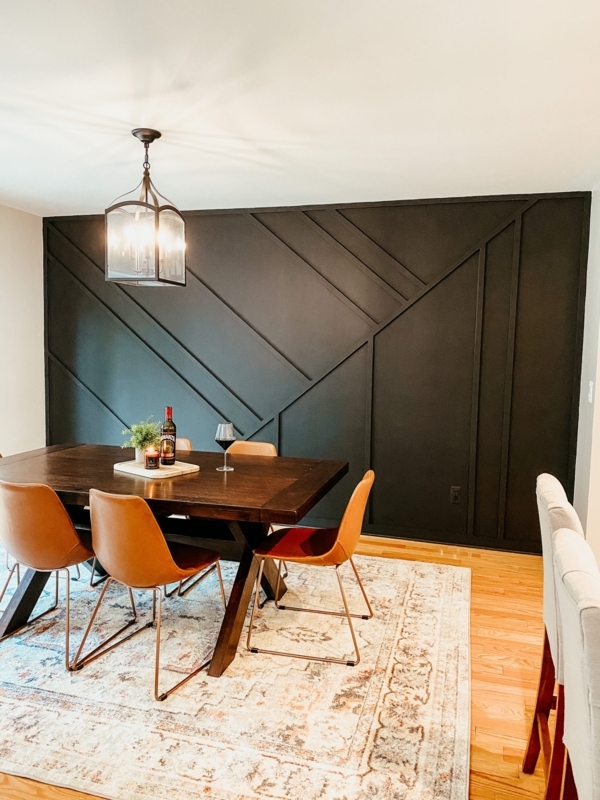 Black Geometric Accent Wall Ideas: Dining Room Cognac Chairs