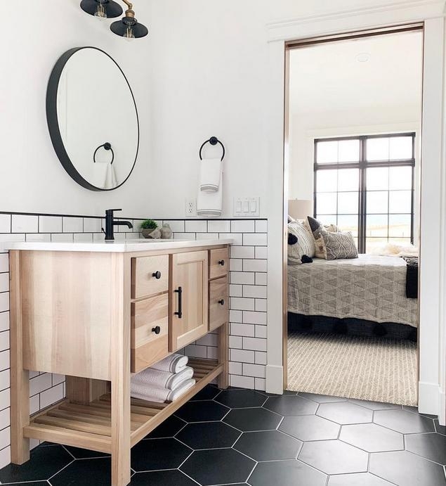 Black Hexagon Floor Tile Bathroom with Light Wood Vanity and Subway Tile