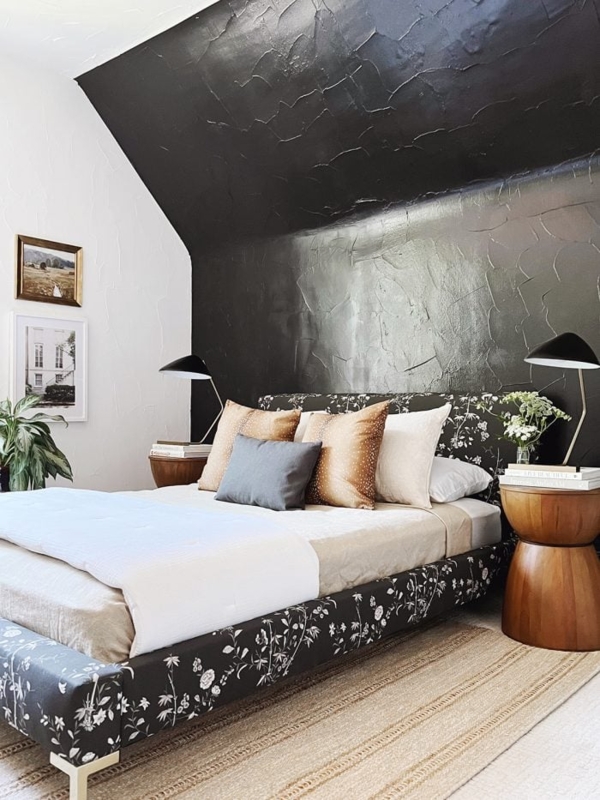 Black Textured Accent Wall Bedroom with Floral Upholstered Bed