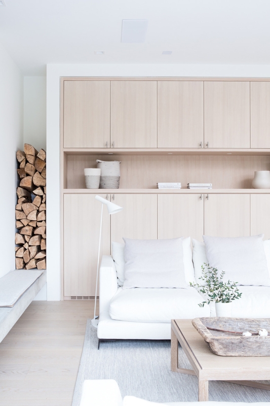 Blonde Wood Built-In Cabinetry with Firewood Niche