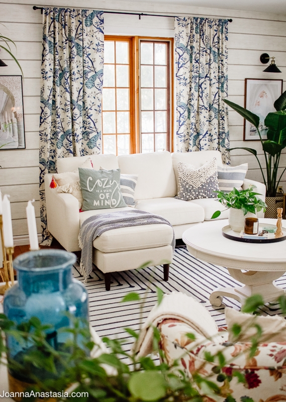 Blue and White Coastal Living Room with Patterned Curtains