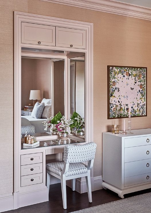 Blush Pink Makeup Vanity featuring Recessed Alcove Design and Glass Top