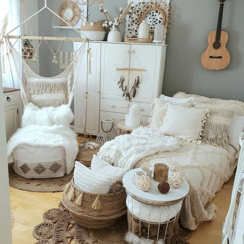 Bohemian Bedroom with Macrame Hanging Chair and Heavily Textured Bedding