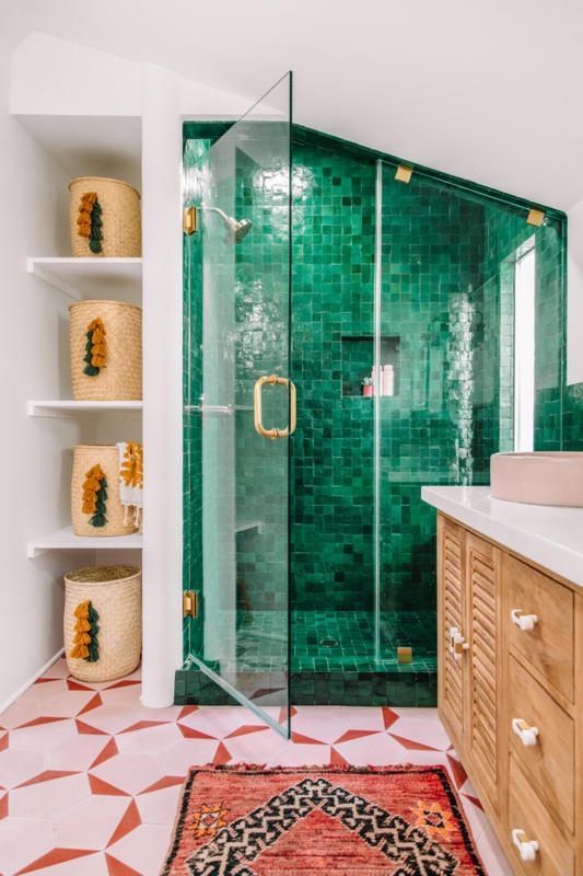 Boho Bathroom with Emerald Green Tiled Shower and Pink Geometric Floor