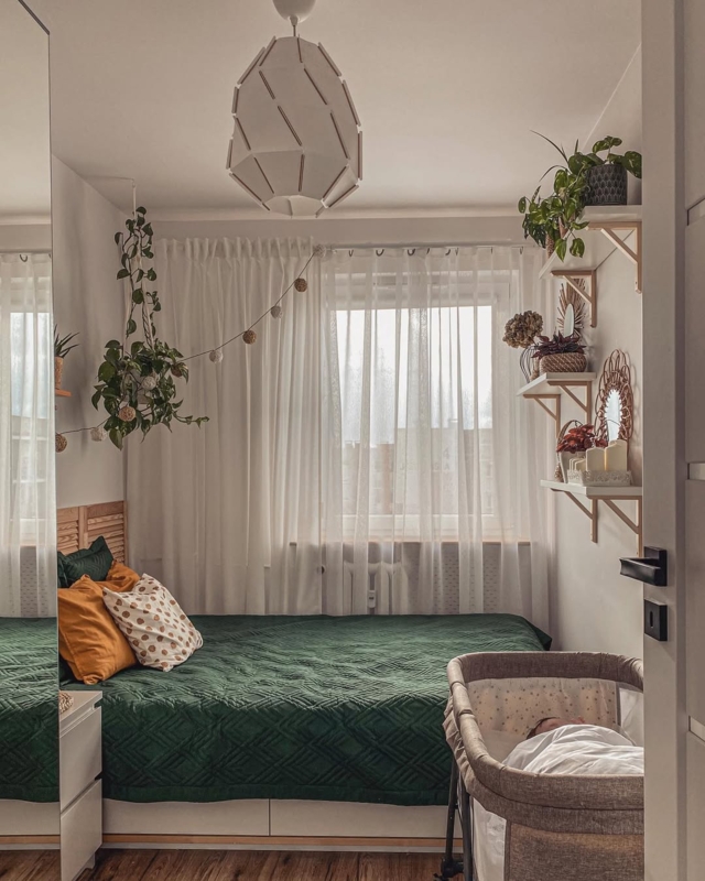 Boho Bedroom with Green Quilted Bed & Integrated Nursery Corner