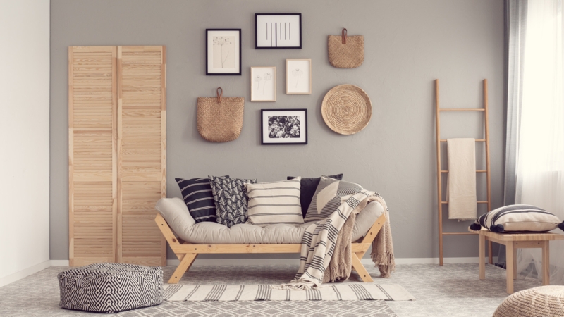 Boho Chic Daybed Styling with Taupe Accent Wall and Woven Decor