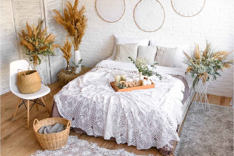 Boho Scandi Bedroom with Crochet Knit Throw and White Brick Wall