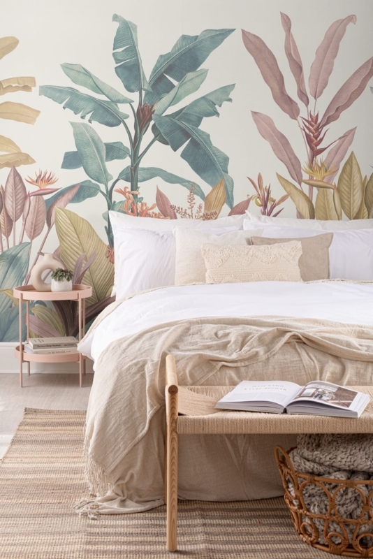 Botanical Wall Mural and Woven Bench in a Coastal Bohemian Bedroom