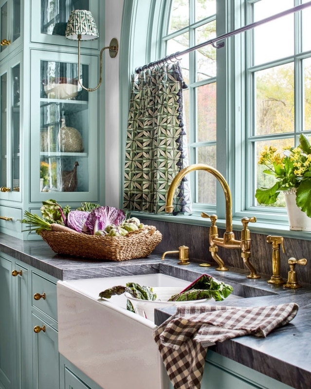 Brass Bridge Faucet Design with Mint Green Cabinetry