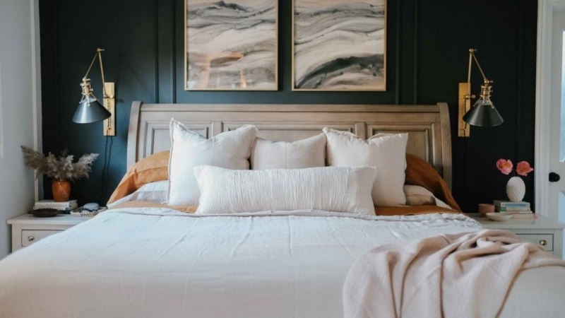 Brass Wall Sconce Swing Arm Dark Green Paneling Moody Bedroom