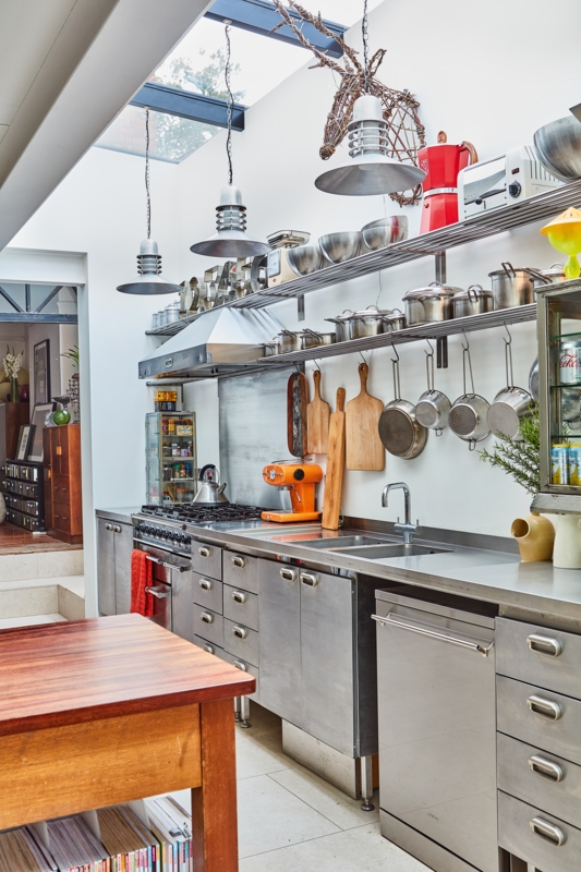 Bright Kitchen with Large Skylight and Stainless Steel Cabinets