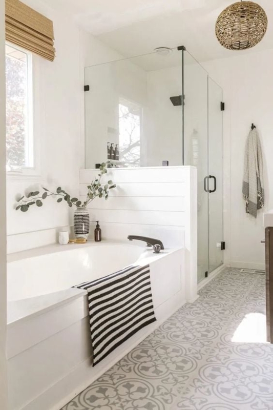 Bright Modern Bathroom with Patterned Tile Floor and Shiplap Tub Surround