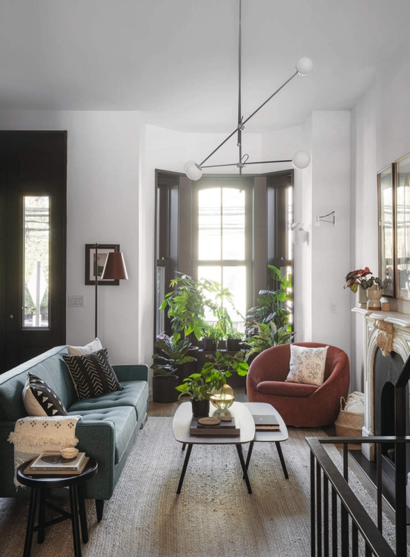 Bright Modern Industrial Living Room: Teal and Rust Palette, Bay Window