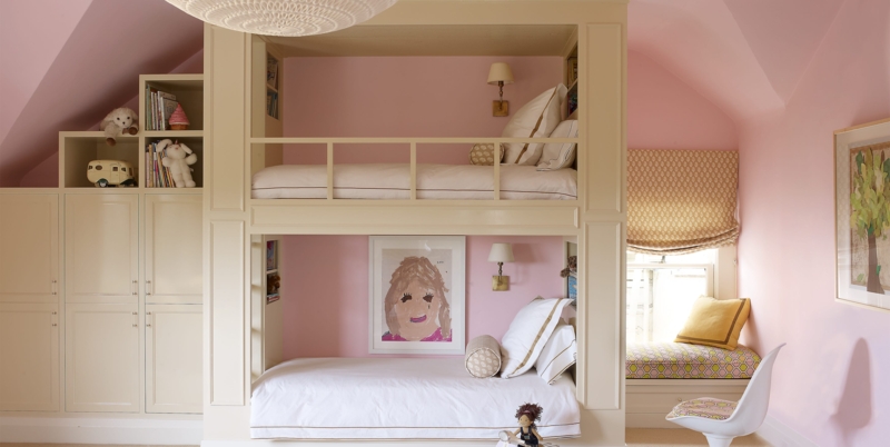 Built-in Bunk Bed with Integrated Bookshelves and a Cozy Window Seat