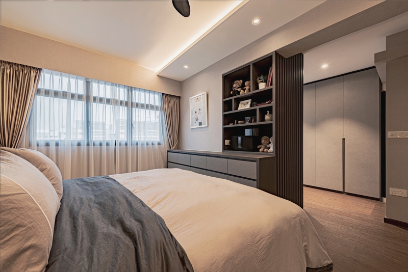 Built-In Shelving as Multifunctional Partition with Integrated Dresser