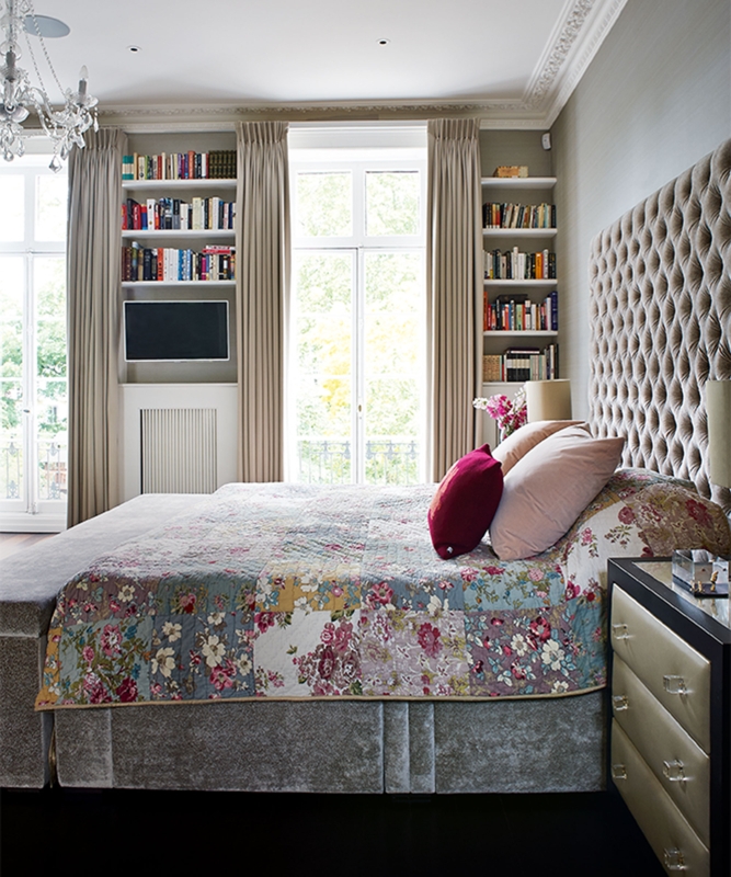Built-in Shelving Flanking Window with Oversized Tufted Headboard