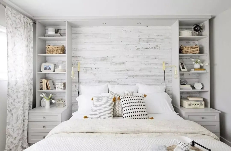 Built-In Storage Unit: Whitewashed Paneling and Integrated Nightstands