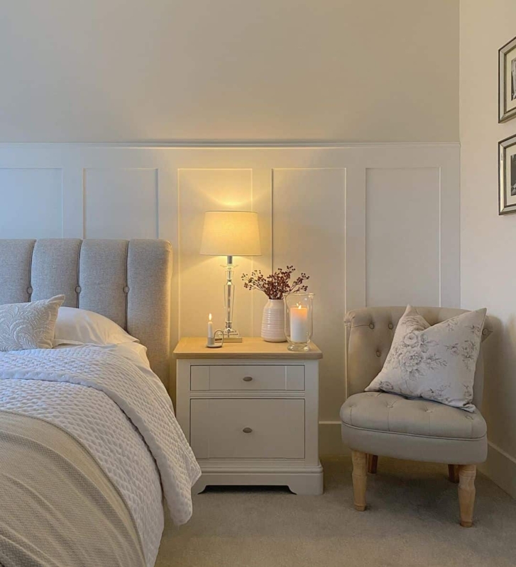 Button Tufted Accent Chair in a Traditional Bedroom with Wainscoting