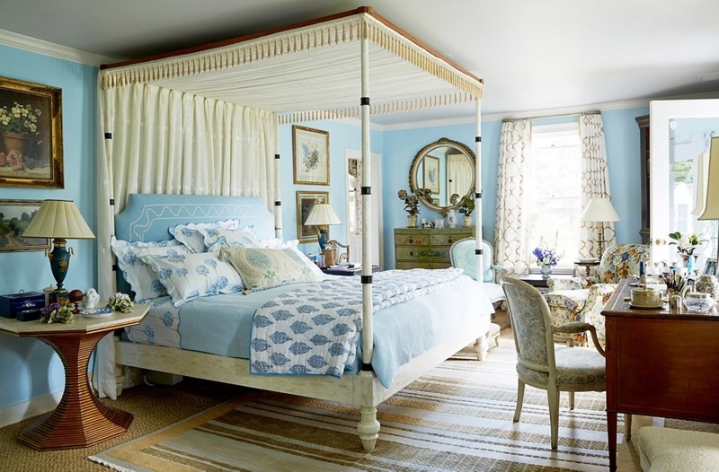 Canopy Bed in Blue and White Master Bedroom with Striped Rug