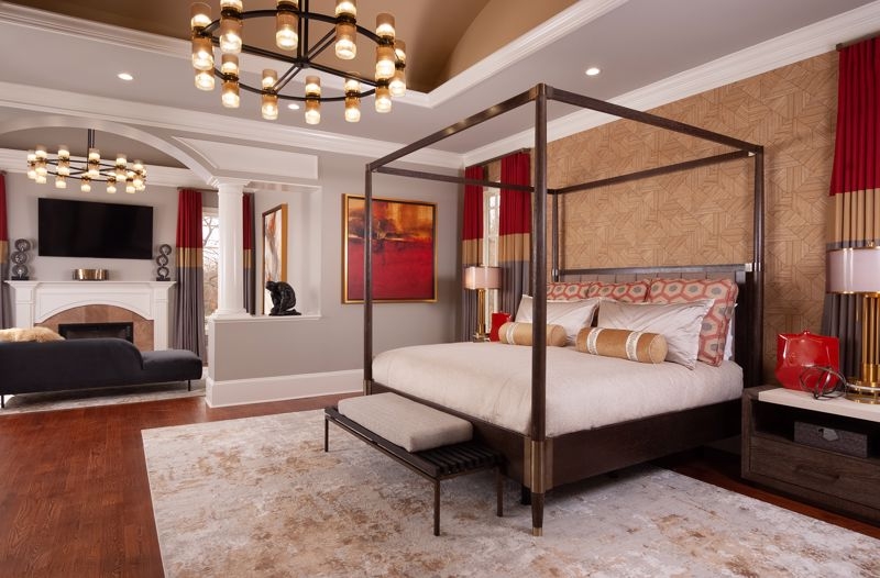 Canopy Bed with Geometric Wallpaper Feature Wall and Fireplace