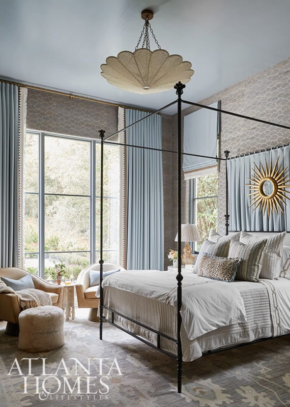 Canopy Bed with Scalloped Pendant in Serene Light Blue Bedroom