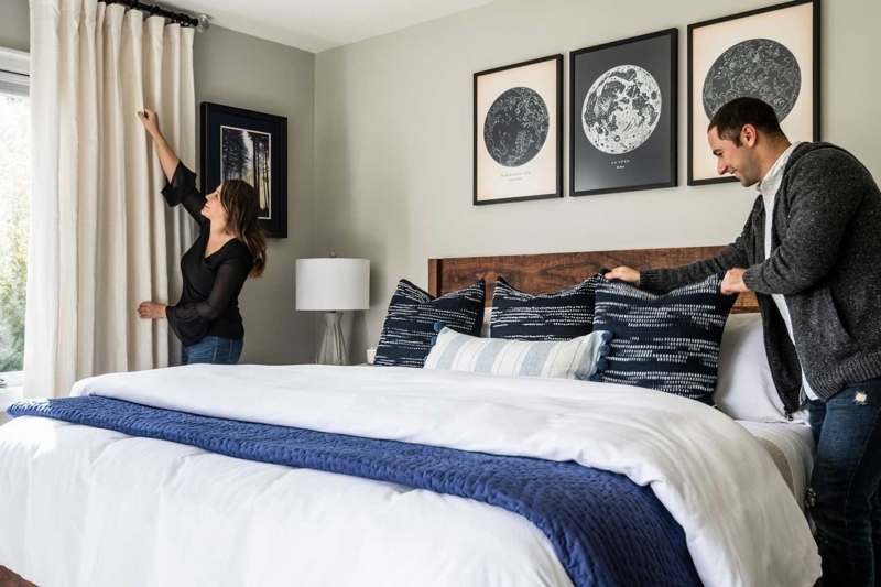 Celestial Wall Art Triptych Over Bed in Navy and White Bedroom