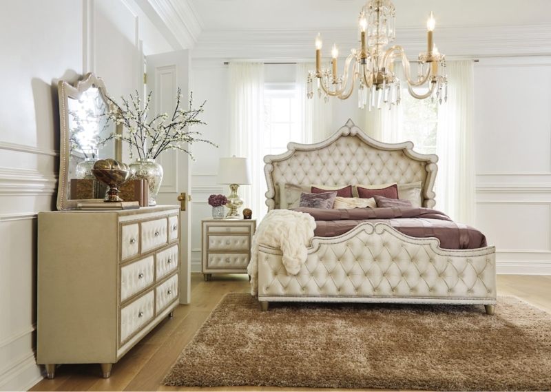 Champagne Upholstered Bed with Nailhead Trim and Plum Accent Pillows