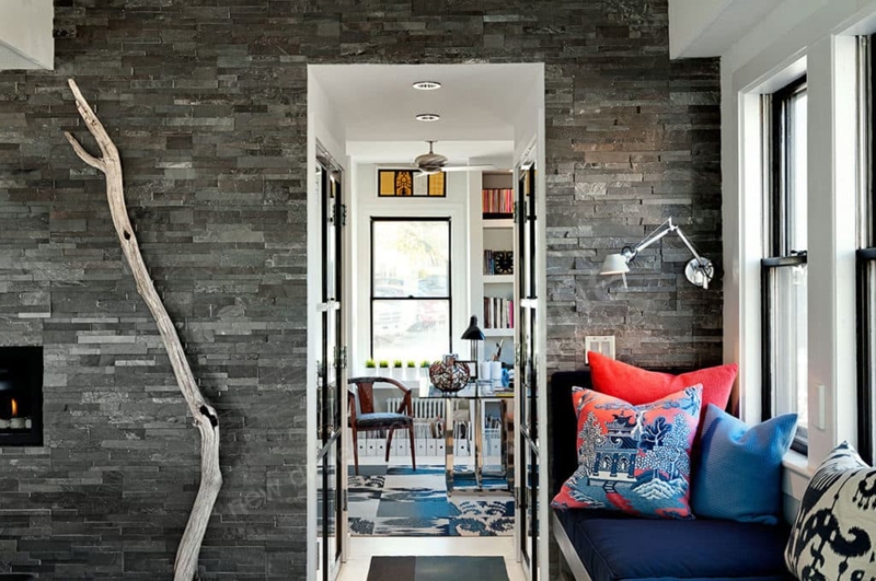 Charcoal Grey Stone Accent Wall with Cozy Window Seat Nook