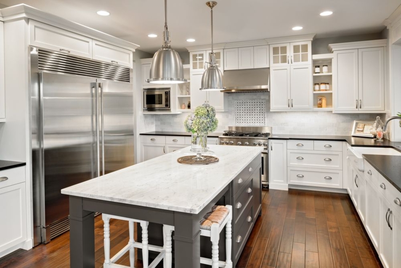 Charcoal Kitchen Island with Marble Top and White Cabinets