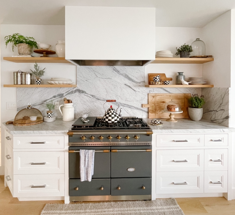 Charcoal Range and Marble Backsplash with Wood Floating Shelves