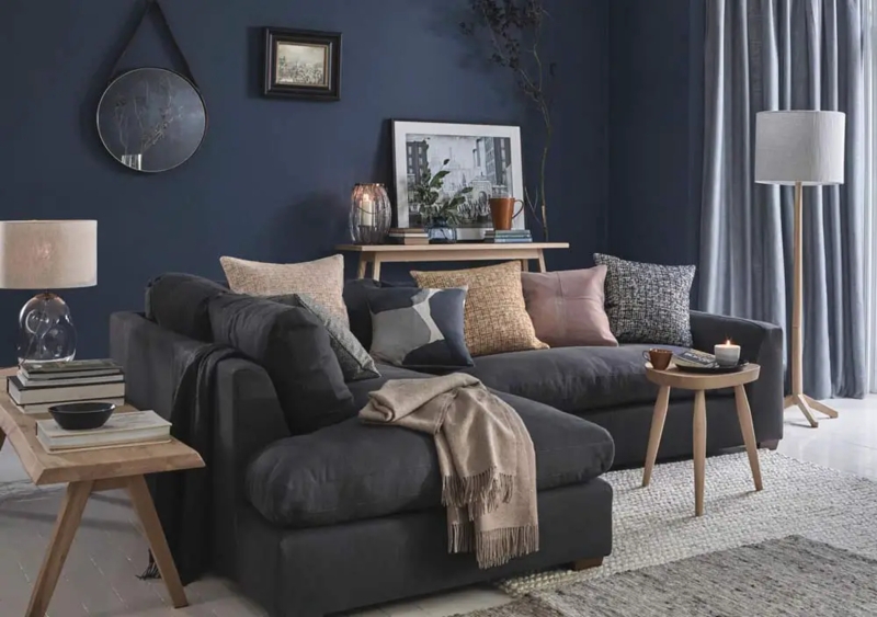 Charcoal Sectional Sofa in Living Room with Navy Walls