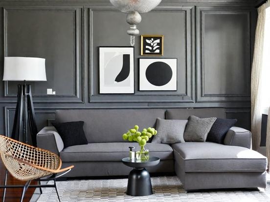 Charcoal Wall Paneling and Lime Accents in Grey Sectional Living Room